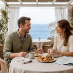 Couple enjoying luxury honeymoon breakfast on terrace