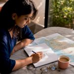 Woman planning personalized trip at home desk