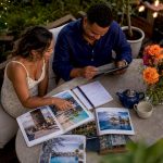 Couple planning destination wedding at home
