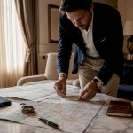 Guide arranging Rome tour maps and itinerary