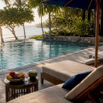 Luxury overwater bungalow deck with ocean view