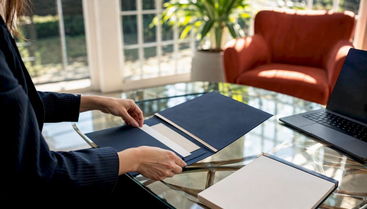 Concierge hands preparing VIP wedding travel plans