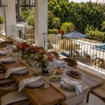 Luxury villa terrace set for family gathering