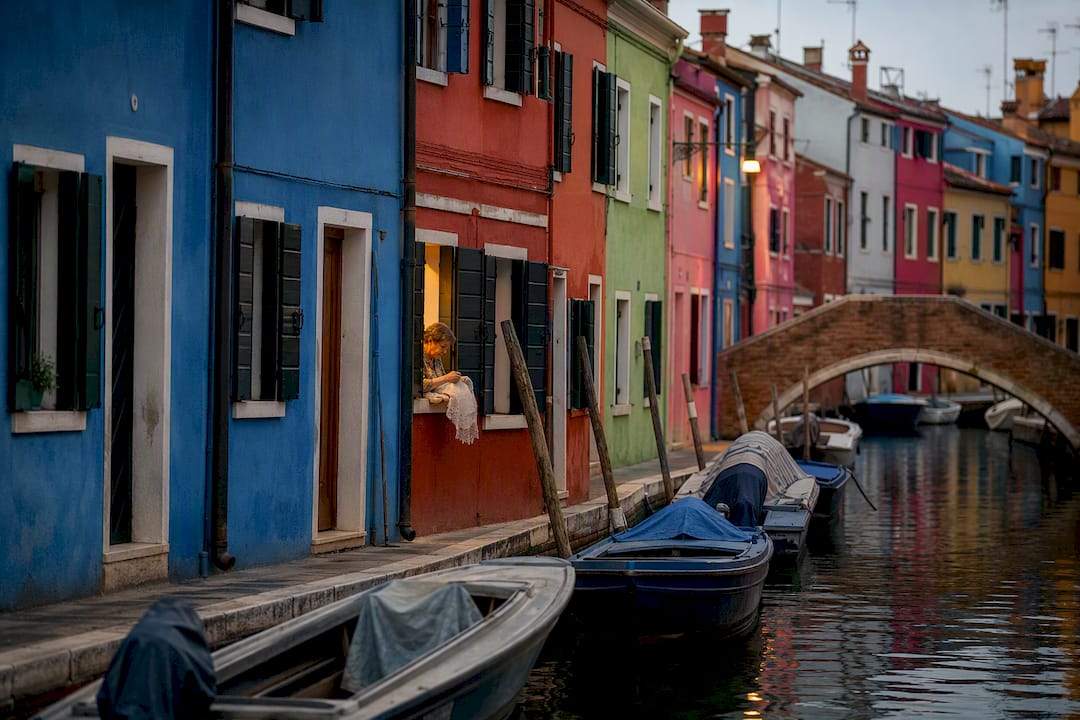 Colorful Burano houses along quiet canal
