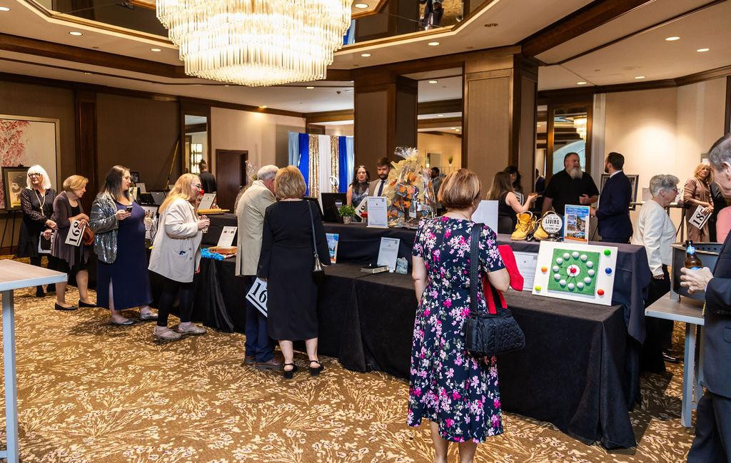 Silent auction display at a nonprofit fundraising gala