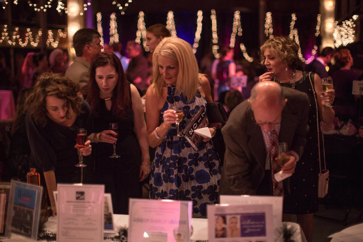 Guests enjoying an evening charity fundraising event