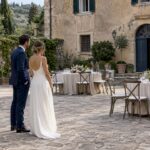 Couple inspecting Italian villa wedding venue