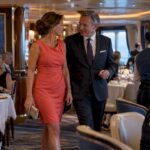 Guests dressed for dinner aboard a cruise ship