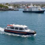 Passenger launch and cruise vessel off Puerto Ayora